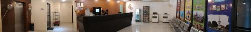 a hallway of a store with a counter in a room at Metro Park Hotel Mandaue in Cebu City