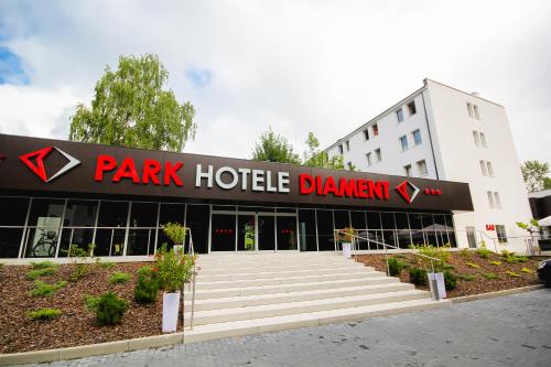 a building with a park hotel sign on it at Hotel Diament Zabrze - Gliwice in Zabrze