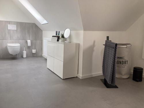 Ένα μπάνιο στο Ferienwohnungen bei der Purpurbuche