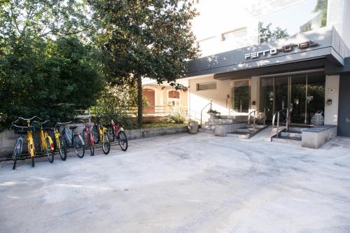 a group of bikes parked outside of a building at FerroHotel in Modica