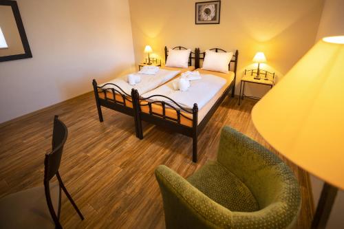 Ένα ή περισσότερα κρεβάτια σε δωμάτιο στο Wellness hotel Lihovar