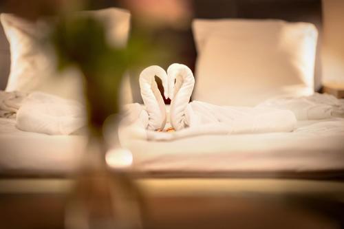 Ένα ή περισσότερα κρεβάτια σε δωμάτιο στο Wellness hotel Lihovar