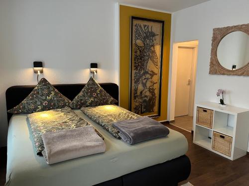 Ένα ή περισσότερα κρεβάτια σε δωμάτιο στο Ferienwohnung1 Daun