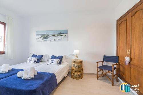 En eller flere senge i et værelse på Villa Inge by Rent Costa Brava
