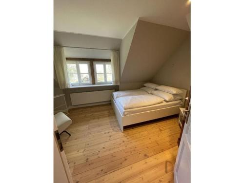 Llit o llits en una habitació de at the Haus Marck moated castle