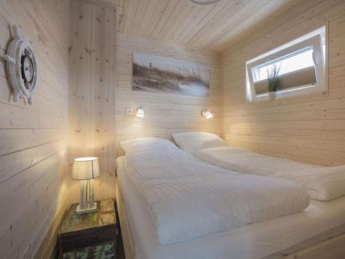 En eller flere senge i et værelse på Oostzee Swantje