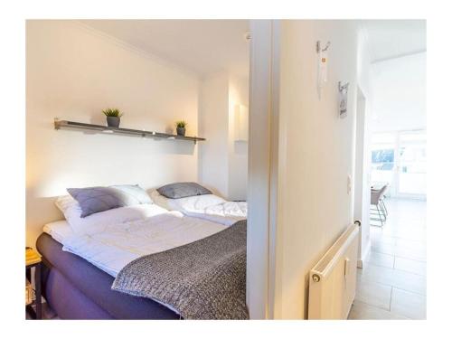 Un pat sau paturi într-o cameră la 2-room luxury apartment