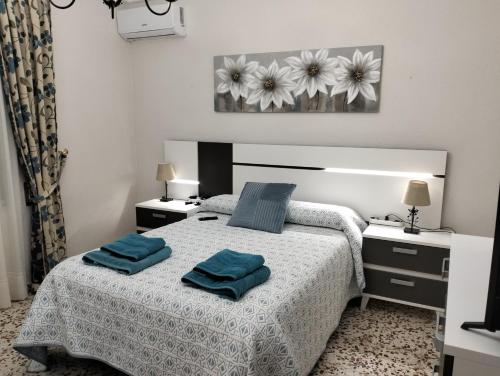 Posteľ alebo postele v izbe v ubytovaní CASA RURAL SITIO DE CASA NUEVA