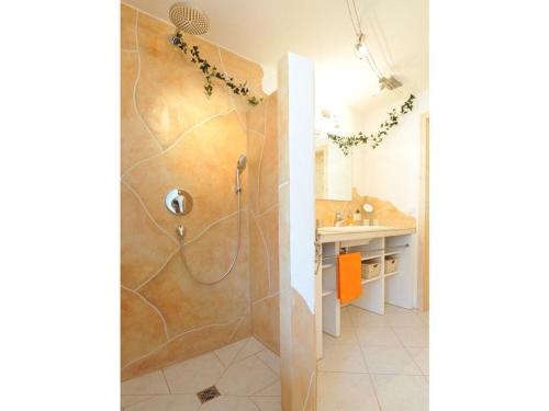 a bathroom with a shower and a sink at Haus Steiner Modern retreat in Oberstdorf