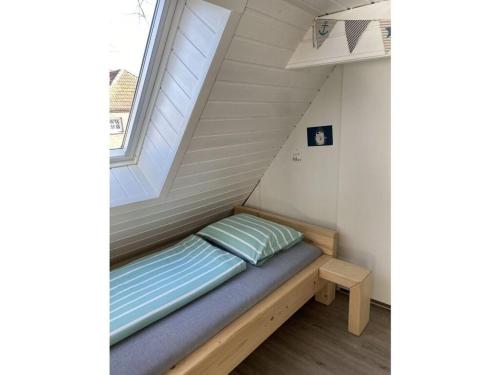 Cama o camas de una habitación en Fischerhus Fehmarn Comfortable holiday residence