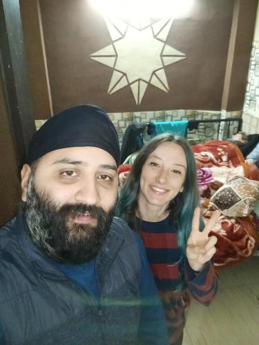 a man and a woman posing for a picture at SIDHU GUEST HOUES -400 walking distance From golden Temple in Amritsar