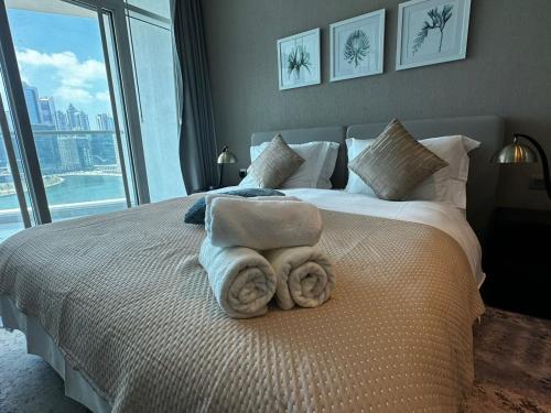 Katil atau katil-katil dalam bilik di Canal View Oasis Studio Apartment
