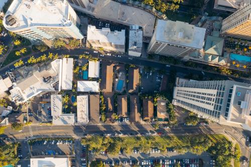 an aerial view of a city with buildings at Waikiki Heritage Hotel in Honolulu