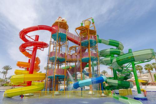 a water park with a colorful water slide at Beach Albatros Resort - Hurghada in Hurghada