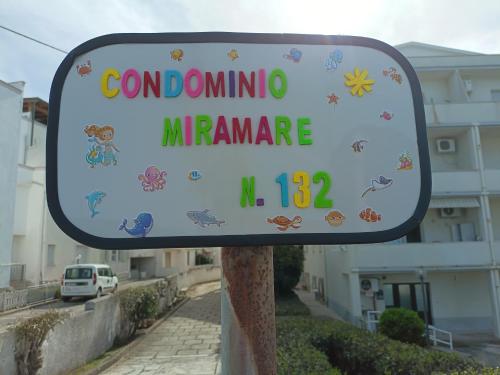 a sign that reads coronino mamanca on a street at Casa a 20 metri dal mare! in Fossacesia