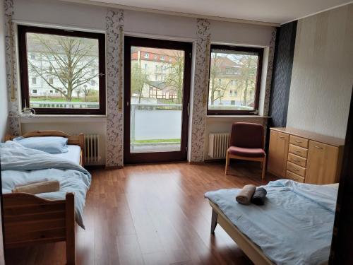 Postel nebo postele na pokoji v ubytování Haus mit Garten mitten im Kurpark für Monteure und Urlauber, 140 qm