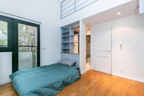 En eller flere senge i et værelse på Villa, centre-ville, Paris, Disneyland, Ascenseur, Parkings