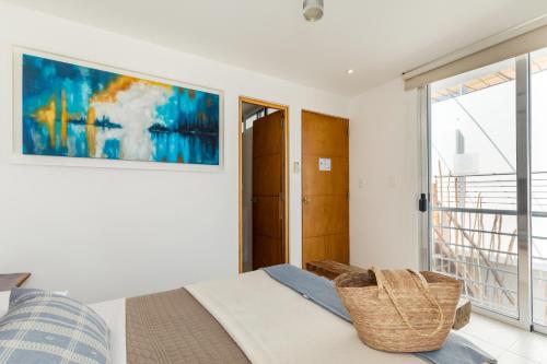 Ένα ή περισσότερα κρεβάτια σε δωμάτιο στο Casa Moderna en Playa Norte Isla Mujeres