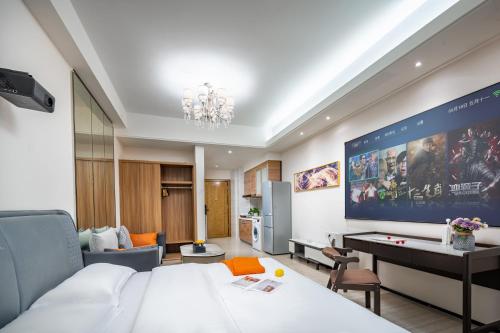 Katil atau katil-katil dalam bilik di Orange Apartments