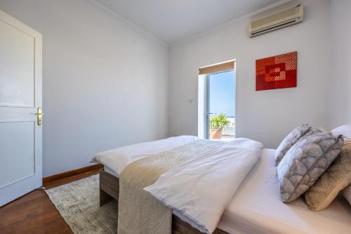 Кровать или кровати в номере Stunning - Seaview Penthouse 3-Bed + Parking