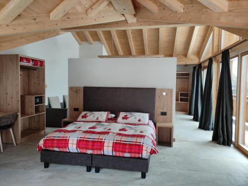 Кровать или кровати в номере Hotel Forcola