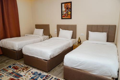Pyramids Hotelにあるベッド