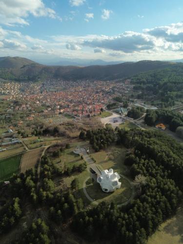 an aerial view of a building in a city at Hotel Montana SPA in Kruševo