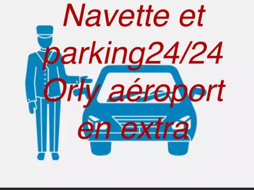 tabliczkę z napisem wahającym się na adapterze parkingowym w obiekcie F2 4 pers 2lits proche 5 min aéroport Orly Chez Sandro et Abby w mieście Athis-Mons