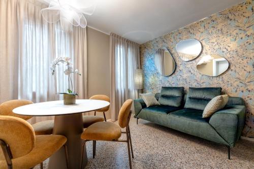 a living room with a couch and a table at Venice Suite San Marco 213 in Venice