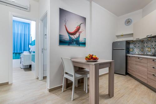Η κουζίνα ή μικρή κουζίνα στο Agio Apartments Diamante - Trilocale Standard