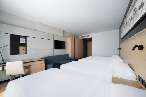 Katil atau katil-katil dalam bilik di Park Inn by Radisson Makkah Thakher Algharbi