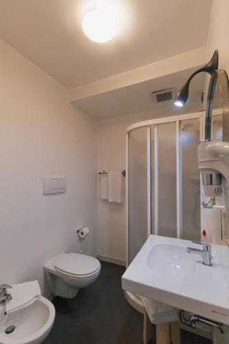 Uma casa de banho em Hotel Gattopardo