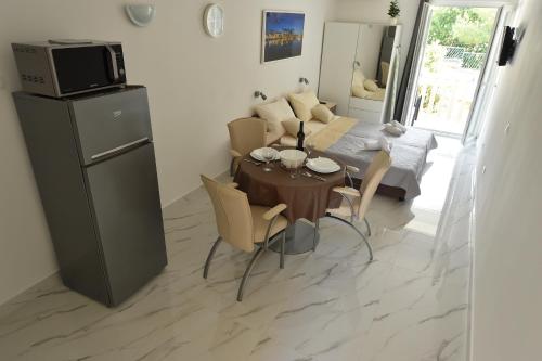 Kuchyň nebo kuchyňský kout v ubytování Beach Apartments Vlado