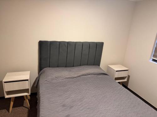 Postel nebo postele na pokoji v ubytování Departamento en La Florida