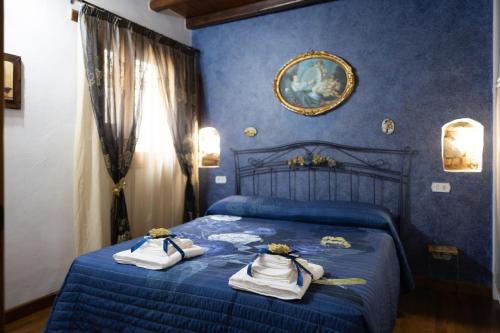 Ένα ή περισσότερα κρεβάτια σε δωμάτιο στο CarMa Apartment