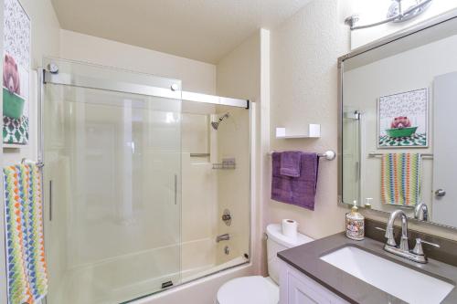 a bathroom with a shower and a sink and a toilet at Lake Access & Hot Tub: Pet-Friendly Arnold Home in Arnold
