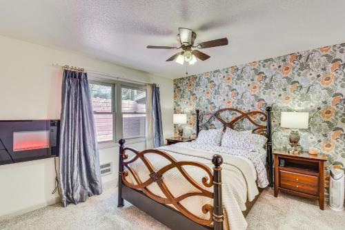 a bedroom with a bed and a ceiling fan at Lake Access & Hot Tub: Pet-Friendly Arnold Home in Arnold