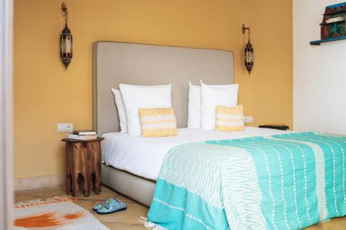Voodi või voodid majutusasutuse Riad Deha & Spa toas
