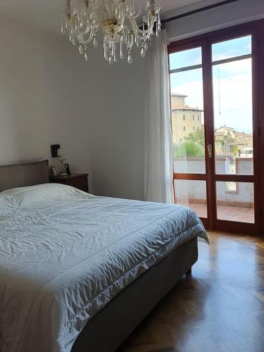 Ένα ή περισσότερα κρεβάτια σε δωμάτιο στο Casa di Laura in Chianti - large & charming house (host 7 people)