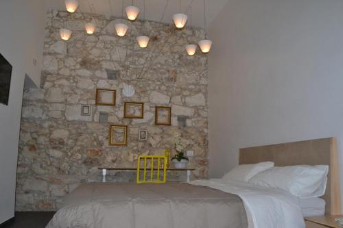 A bed or beds in a room at B&B Siracusa