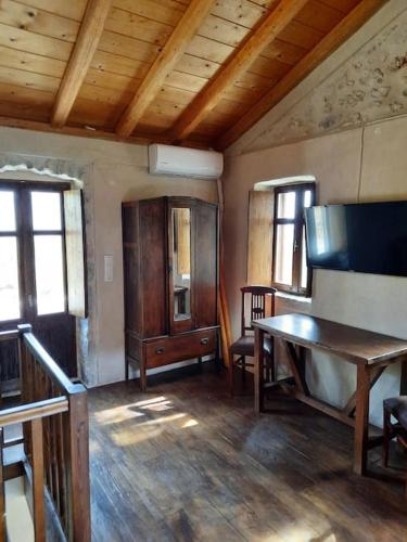 TV a/nebo společenská místnost v ubytování Casa Tsiliviani