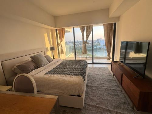 Postel nebo postele na pokoji v ubytování Luxury Penthouse in Cabo Norte
