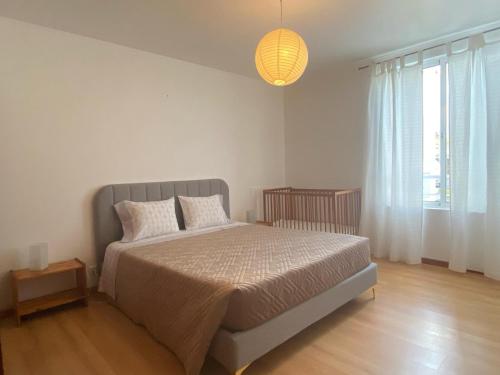 Postel nebo postele na pokoji v ubytování São Roque Apartment