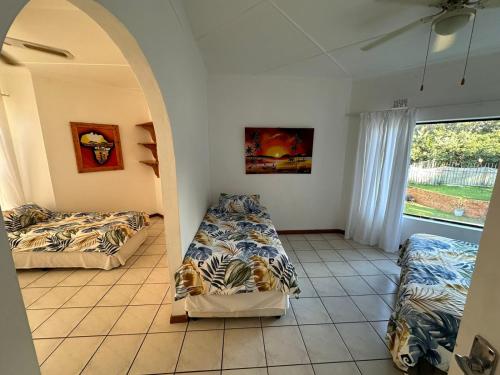 Katil atau katil-katil dalam bilik di Surf and Sun Accommodation