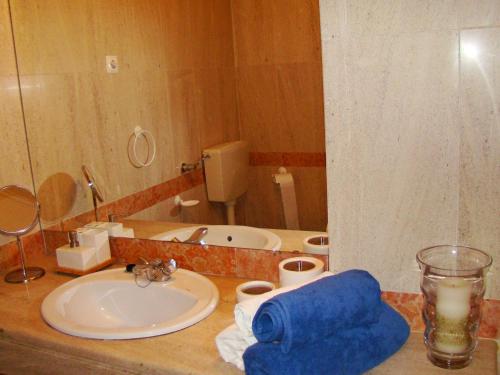 Kylpyhuone majoituspaikassa Tejo Apartment