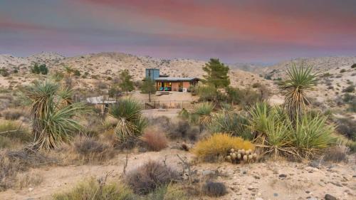 a house in the middle of the desert at Morongo Star Ranch - Rolling Country Hills w Pool in Morongo Valley