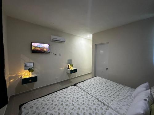 Postel nebo postele na pokoji v ubytování Hotel Mi Dulce Amanecer PyR