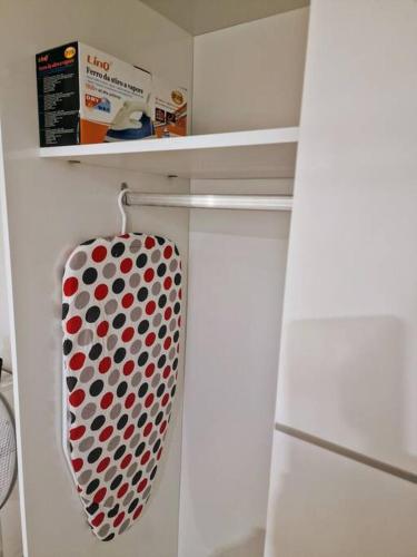 a white refrigerator with a polka dot object in it at Casa vacanza Castello in Cagliari