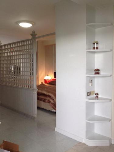 Katil atau katil-katil dalam bilik di Beach Holiday