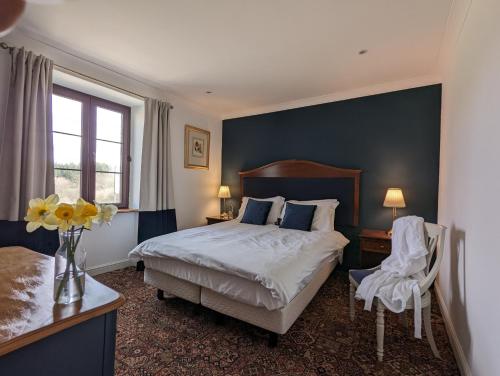Ένα ή περισσότερα κρεβάτια σε δωμάτιο στο Trente-Trois Le Nouhaud
